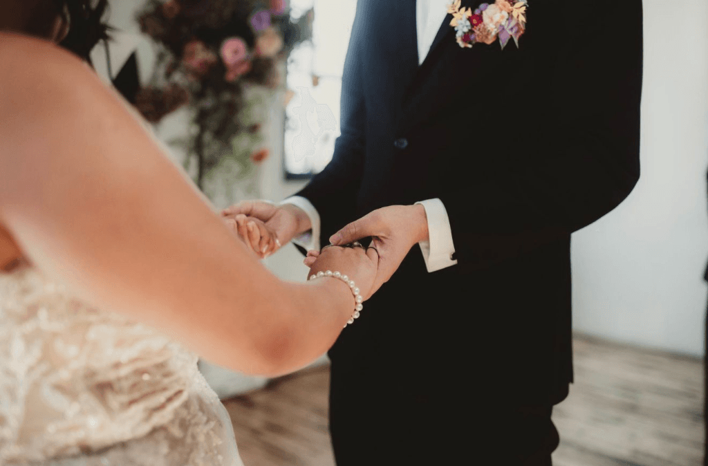 Professional wedding officiant organizing a detailed wedding ceremony plan in Jacksonville Florida