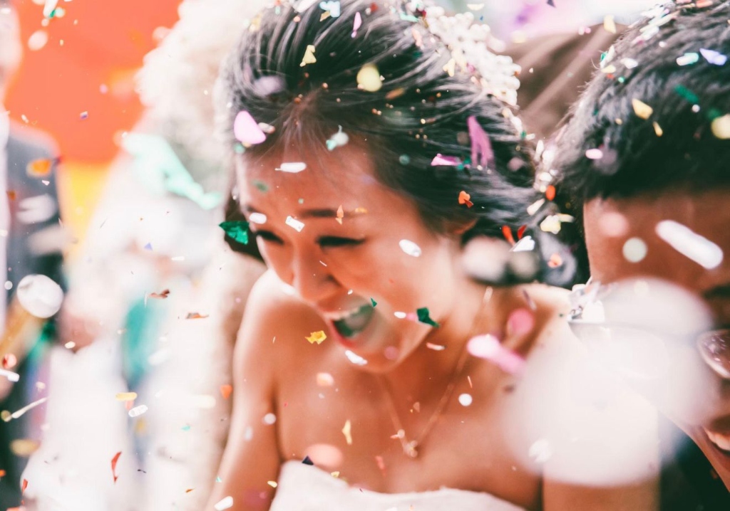 Happy couple celebrating their personalized beach wedding ceremony in Jacksonville, Florida